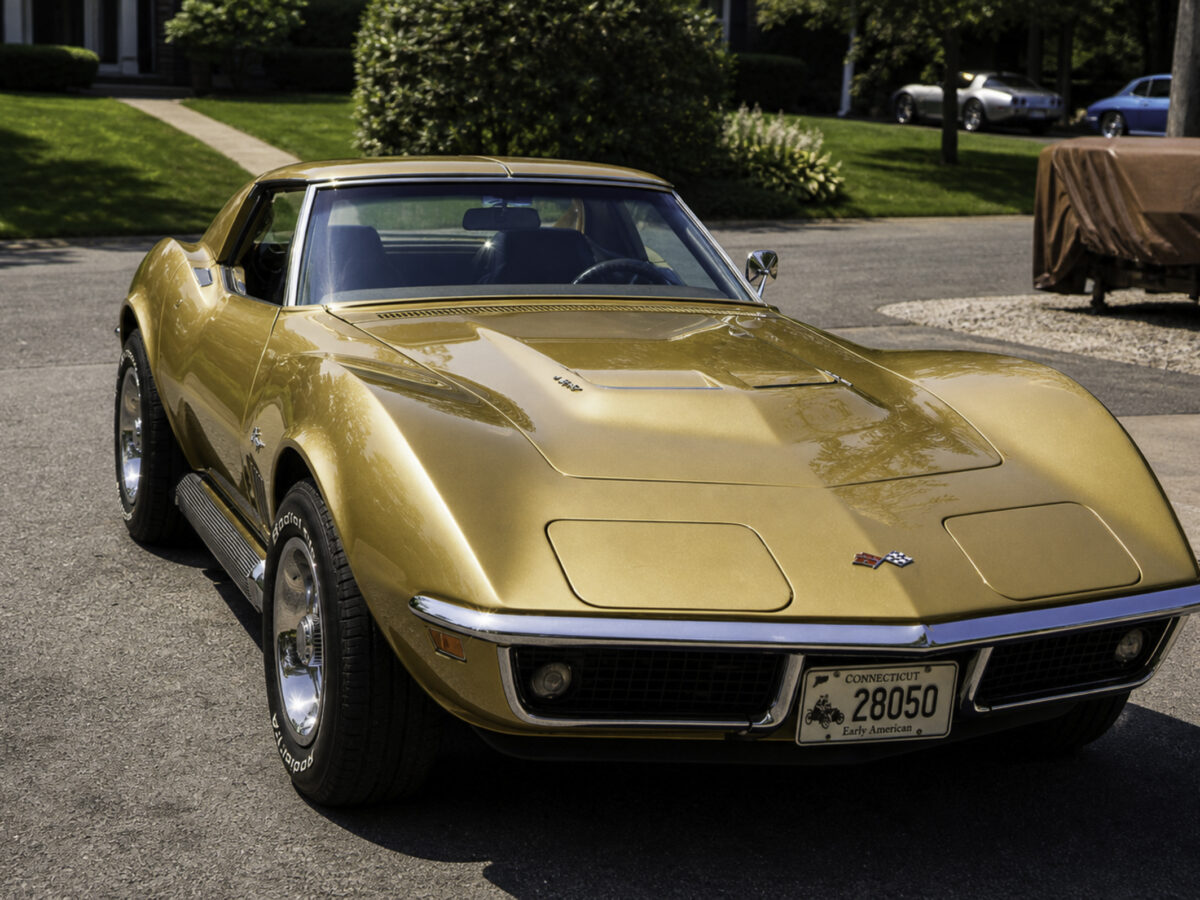 Enhanced original photo of a gold classic Chevrolet Corvette front view restored by Corvette Connection in Bolton, Connecticut.