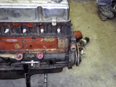 1954 Corvette Blue Flame inline-six engine on shop floor before rebuild at Corvette Connection