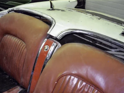 1954 Corvette brake drums and wheels laid out during disassembly