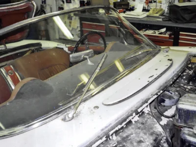 1954 Corvette frame on jack stands with engine removed during restoration at Corvette Connection