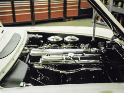 1954 Corvette restored Blue Flame inline-six engine bay during final assembly at Corvette Connection
