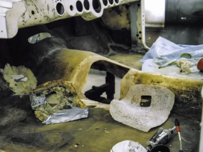 1954 Corvette inner fender well showing fiberglass layup and repair at Corvette Connection