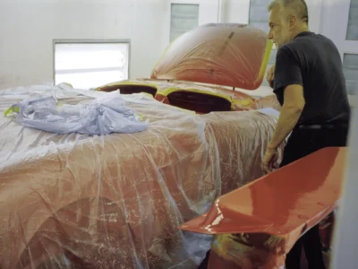 1954 Corvette body in red paint with interior masked in paint booth