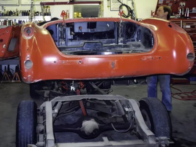 1957 Corvette rear body section showing trunk opening and taillight area during restoration