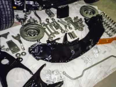 Transmission and drivetrain components laid out during 1957 Corvette frame-off restoration