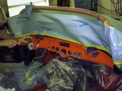 1957 Corvette red dashboard and gauges masked during final assembly