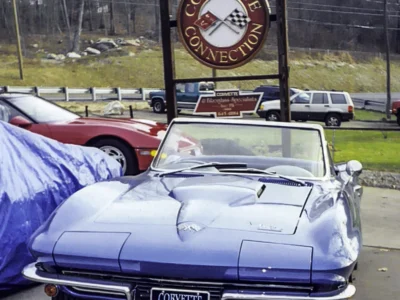 1966 Corvette Sting Ray in Nassau Blue arriving at Corvette Connection with Corvette Connection sign visible