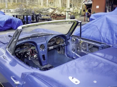 1966 Corvette Sting Ray interior stripped showing bare dashboard and windshield frame