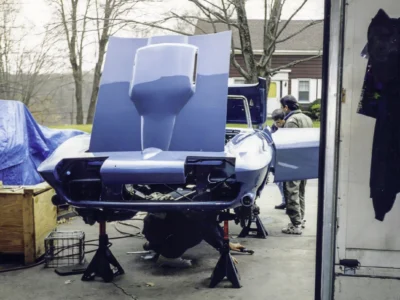 1966 Corvette Sting Ray hood removed and body on stands at Corvette Connection in Bolton CT