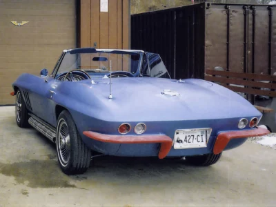1966 Corvette Sting Ray in Nassau Blue rear three-quarter view at Corvette Connection garage