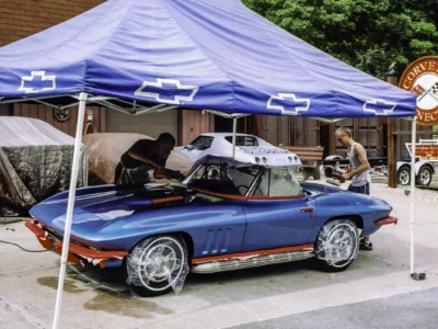 1966 Corvette Sting Ray convertible in Nassau Blue being detailed at car show under tent