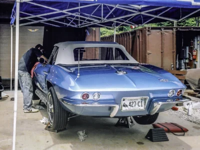 Completed 1966 Corvette Sting Ray convertible in Nassau Blue rear view at car show