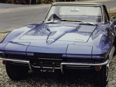 Enhanced original photo of a blue 1964 Chevrolet Corvette coupe front detail by Corvette Connection in Bolton, Connecticut.
