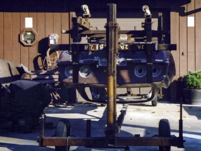 1968 Corvette frame mounted on a restoration jig at Corvette Connection in Bolton, CT