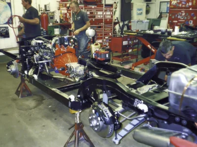 1968 Corvette chassis assembly in the restoration shop with engine and suspension installed