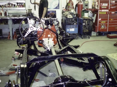 Front three-quarter of 1962 Corvette rolling chassis with engine and front suspension