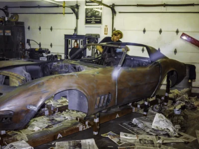 Technician working on 1968 Corvette body fitment at Corvette Connection