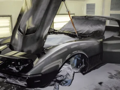 1968 Corvette Stingray hood and headlight area in black paint during final assembly