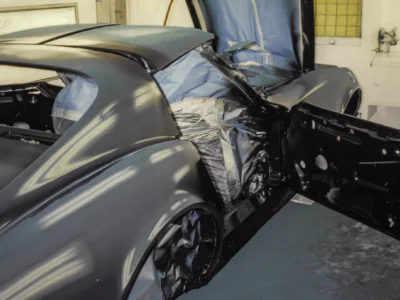 1968 Corvette Stingray engine bay area in black paint during final paint stage