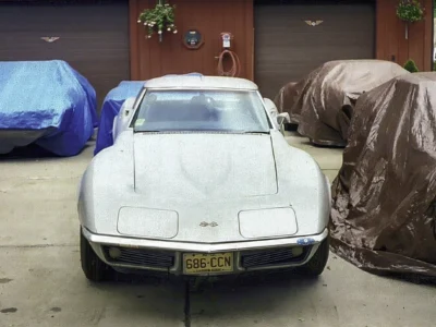 Front view of white 1968 Corvette parked outside Corvette Connection in Bolton, CT.