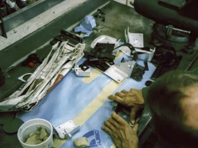 Close-up of 1968 Corvette interior wiring and body components during restoration