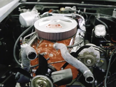 1968 Corvette engine bay with red small-block engine and air cleaner installed