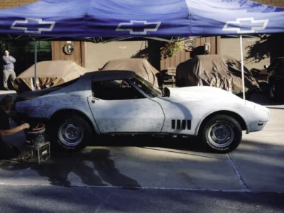 1968 Corvette under a canopy during final assembly or inspection