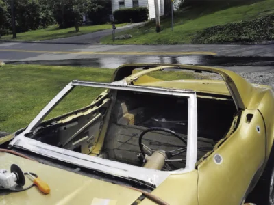 Overhead view of gold 1969 Corvette convertible interior during restoration.