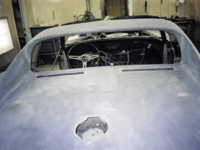 1969 Corvette rear deck and cockpit area in white primer.