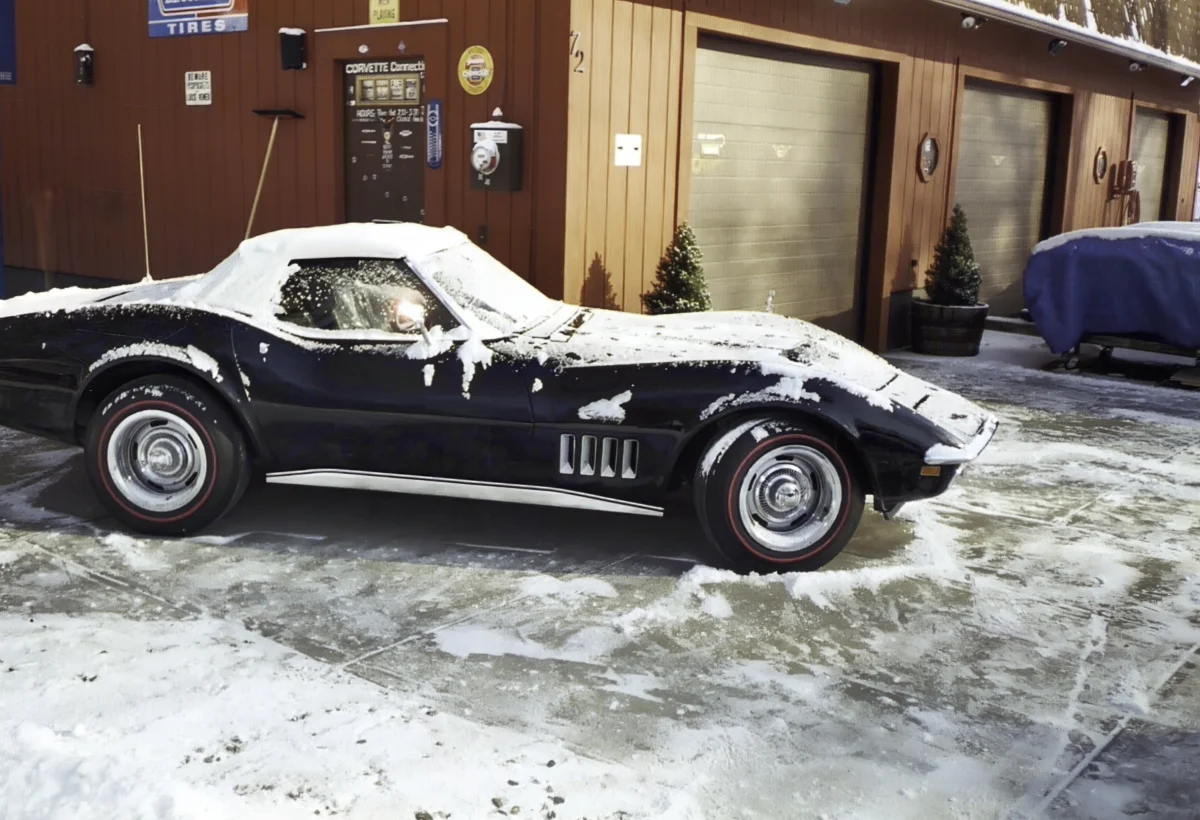 Black 1969 Corvette convertible parked outside Corvette Connection in Bolton, CT.