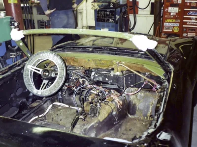 1969 Corvette dashboard and wiring exposed during interior restoration.