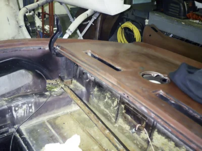 1969 Corvette rear deck and convertible top area during disassembly.