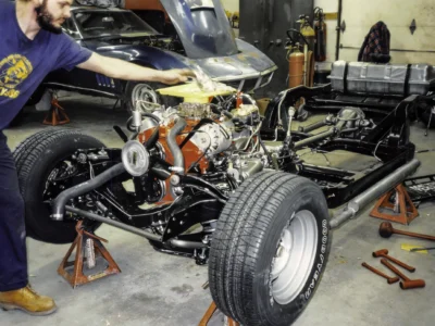 1969 Corvette rolling chassis with front wheel and tire assembled at Corvette Connection