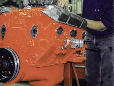 1969 Corvette engine block in red paint during rebuild at Corvette Connection