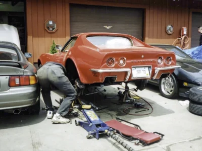 Red 1970 Corvette rear section being worked on inside Corvette Connection in Bolton, CT.