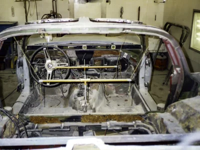 Rear interior section of a stripped 1970 Corvette body shell during restoration.