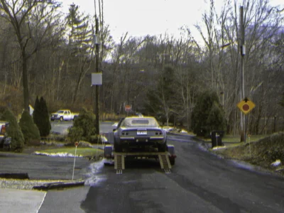 McBurnie Daytona Spyder in primer being driven outdoors at Corvette Connection in Bolton CT