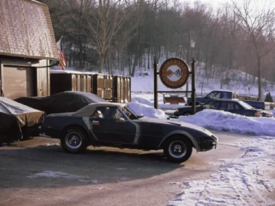 McBurnie Daytona Spyder in dark primer outdoors at Corvette Connection in Bolton CT