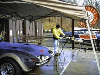 McBurnie Daytona Spyder under tarp being worked on outdoors at Corvette Connection in Bolton CT