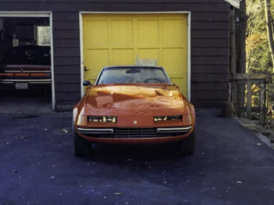 McBurnie Daytona Spyder replica in red side profile outdoors at Corvette Connection in Bolton CT