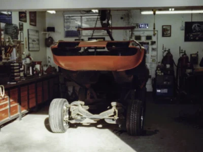 McBurnie Daytona Spyder replica in red outdoors at Corvette Connection in Bolton CT