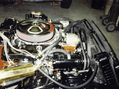 McBurnie Daytona Spyder engine bay showing 350 V8 with wiring and accessories installed