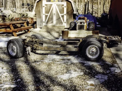 McBurnie Daytona Spyder C3 rolling chassis outdoors in snow at Corvette Connection in Bolton CT