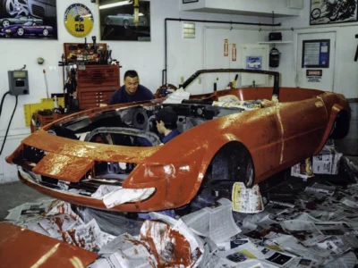 McBurnie Daytona Spyder in red paint rear three-quarter view at Corvette Connection