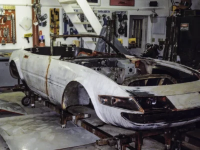 McBurnie Daytona Spyder body in primer on C3 chassis in shop at Corvette Connection