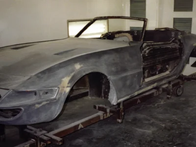 McBurnie Daytona Spyder body in primer showing windshield frame and body lines