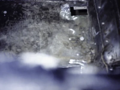 McBurnie Daytona Spyder body panel close-up showing fiberglass surface during body work