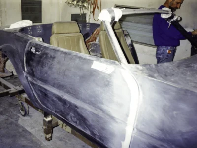 McBurnie Daytona Spyder fiberglass body panel close-up showing body lines during fitting