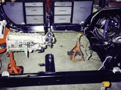 McBurnie Daytona Spyder C3 frame and drivetrain during chassis assembly at Corvette Connection