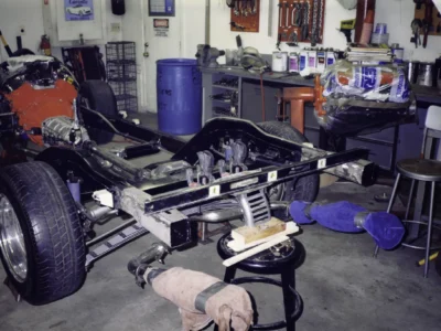 McBurnie Daytona Spyder C3 chassis and suspension assembly in shop at Corvette Connection